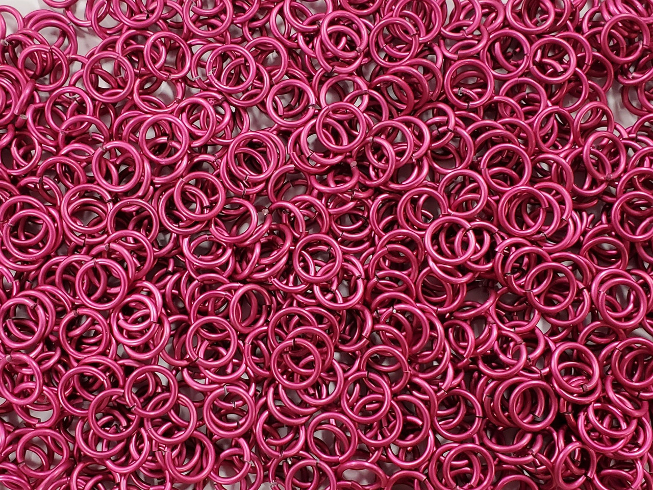Cosmic Pink Anodized Aluminum jump rings in 14 SWG, 3/8 inch ID, 1/2 lb (8 oz)