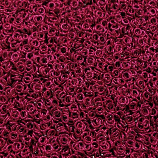 Cosmic Pink Anodized Aluminum jump rings in 18 SWG, 9/64 inch ID, 1/4 lb (4 oz)