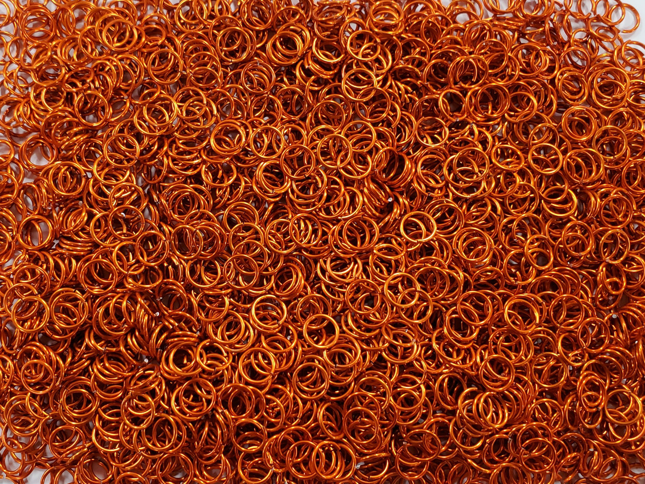 Orange Anodized Aluminum jump rings in 18 SWG, 5/16 inch ID, 1/2 lb (8 oz)