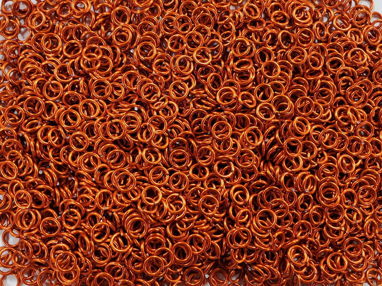 Orange Anodized Aluminum jump rings in 16 SWG, 1/4 inch ID, 1/2 lb (8 oz)