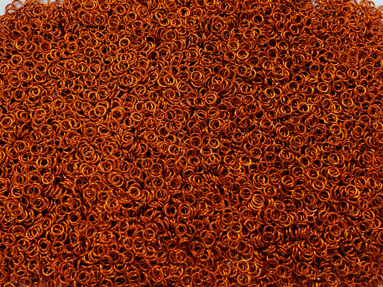 Orange Anodized Aluminum jump rings in 20 SWG, 5/32 inch ID, 1/4 lb (4 oz)