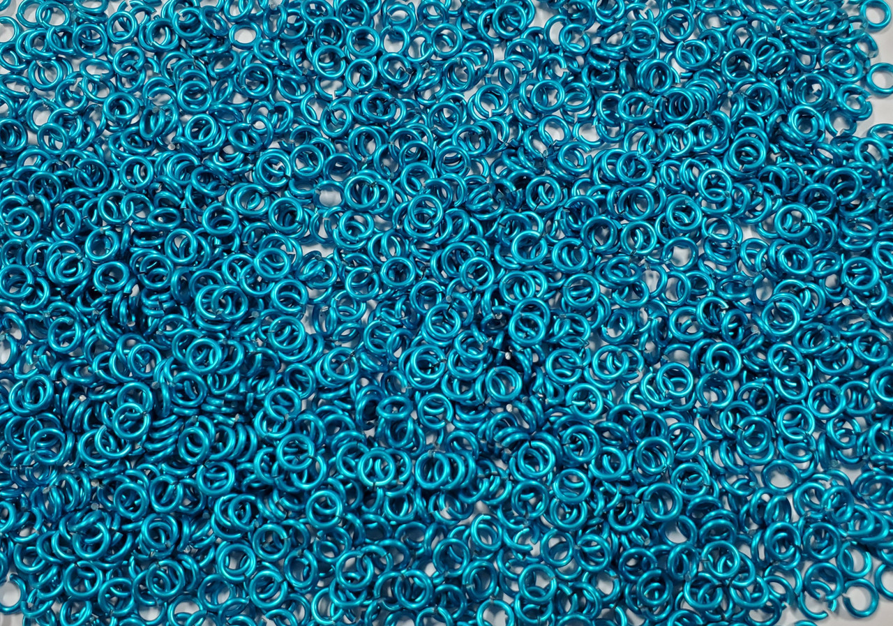 Turquoise Anodized Aluminum jump rings in 18 SWG, 9/64 inch ID, 1/4 lb (4 oz)