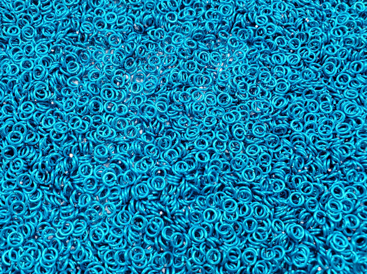 Turquoise Anodized Aluminum jump rings in 20 SWG, 1/8 inch ID, 1/4 lb (4 oz)