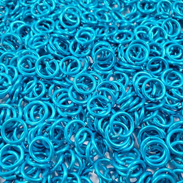 Turquoise Anodized Aluminum jump rings in 16 SWG, 9/32 inch ID, 1/2 lb (8 oz)