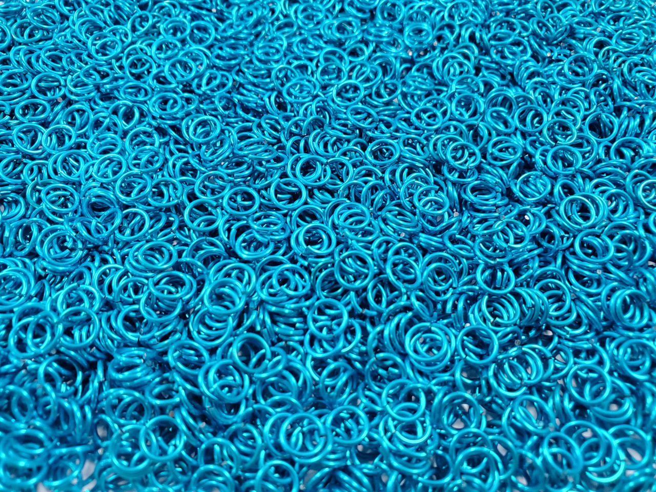 Turquoise Anodized Aluminum jump rings in 20 SWG, 3/16 inch ID, 1/4 lb (4 oz)