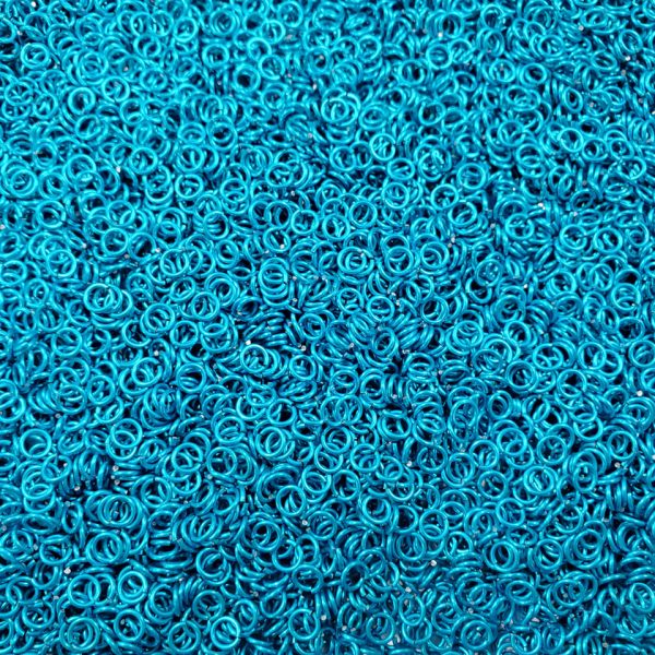 Turquoise Anodized Aluminum jump rings in 20 SWG, 9/64 inch ID, 1/4 lb (4 oz)