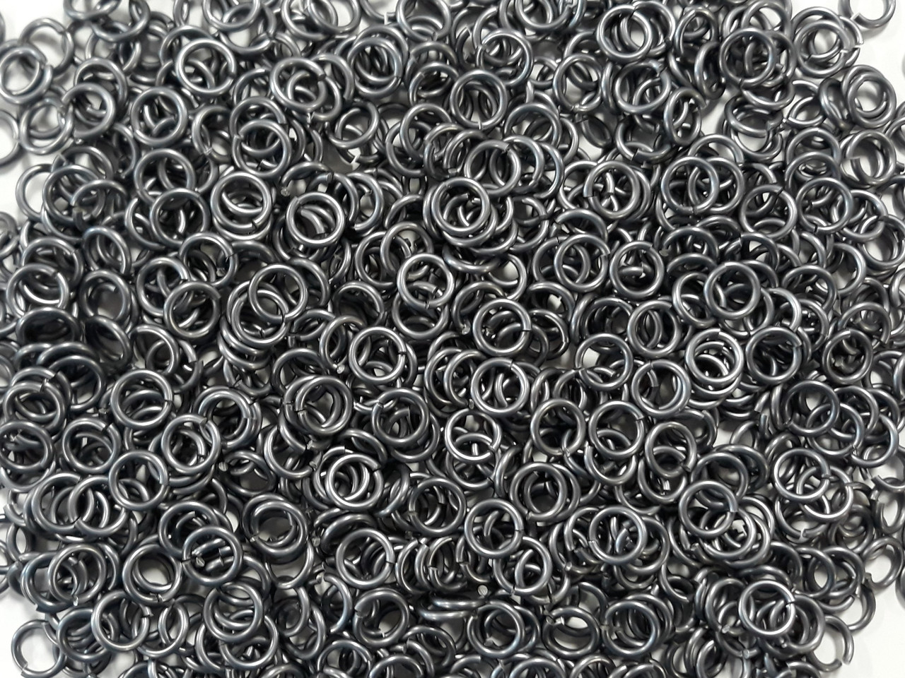 Stormy Gray Anodized Aluminum jump rings in 14 SWG, 5/16 inch ID, 1/2 lb (8 oz)