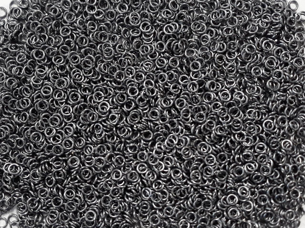 Stormy Gray Anodized Aluminum jump rings in 18 SWG, 5/32 inch ID, 1/2 lb (8 oz)