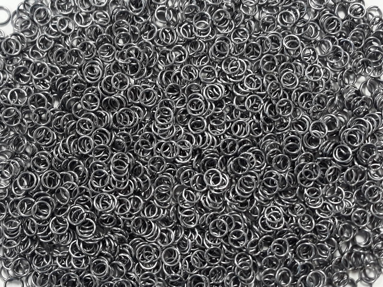 Stormy Gray Anodized Aluminum jump rings in 18 SWG, 1/4 inch ID, 1/2 lb (8 oz)