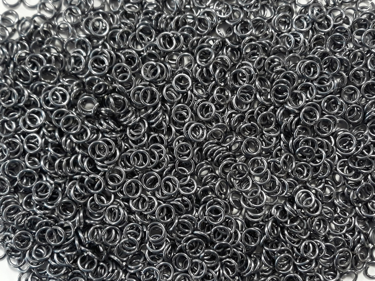 Stormy Gray Anodized Aluminum jump rings in 16 SWG, 1/4 inch ID, 1/2 lb (8 oz)