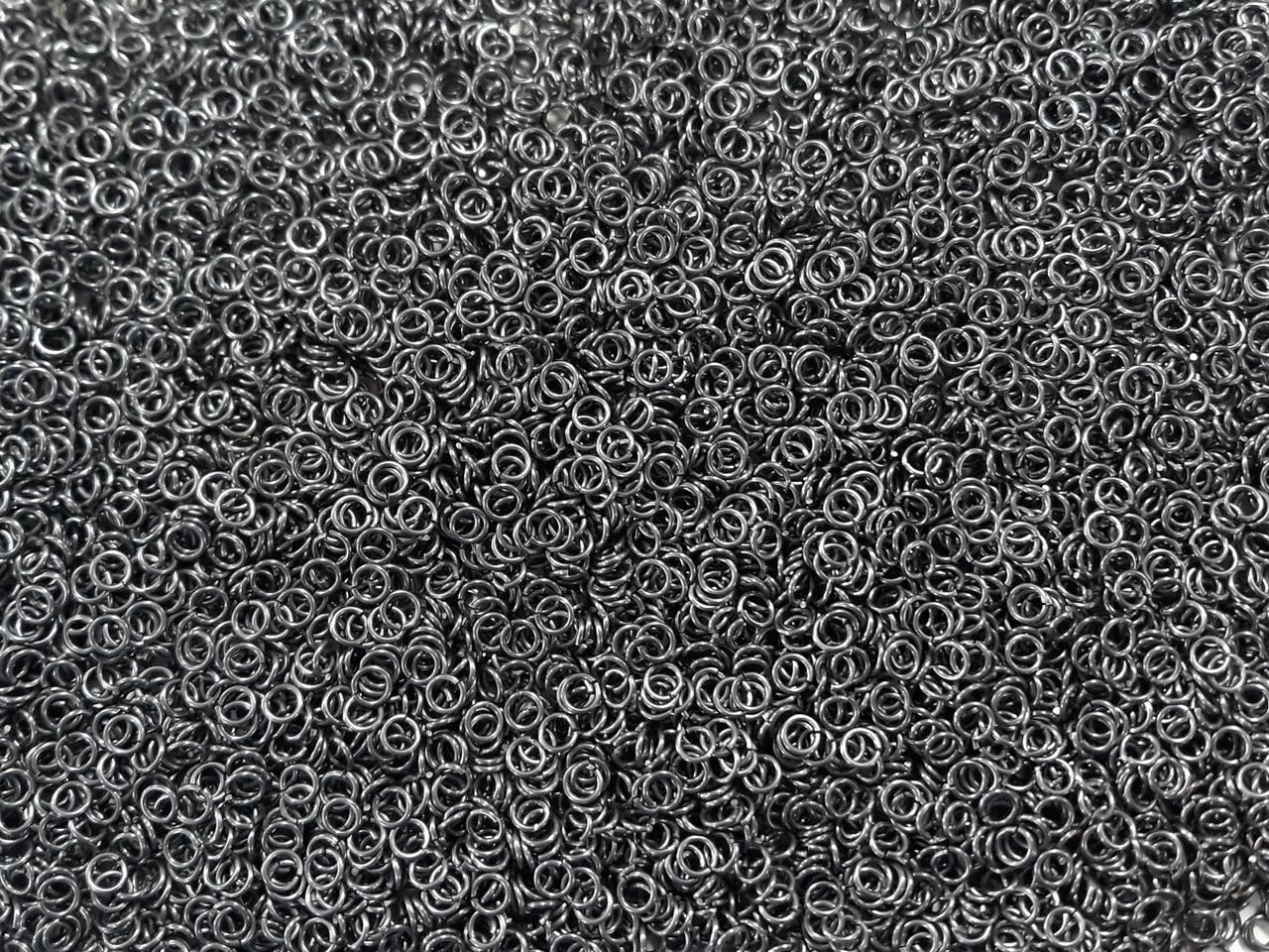 Stormy Gray Anodized Aluminum jump rings in 20 SWG, 9/64 inch ID, 1/4 lb (4 oz)