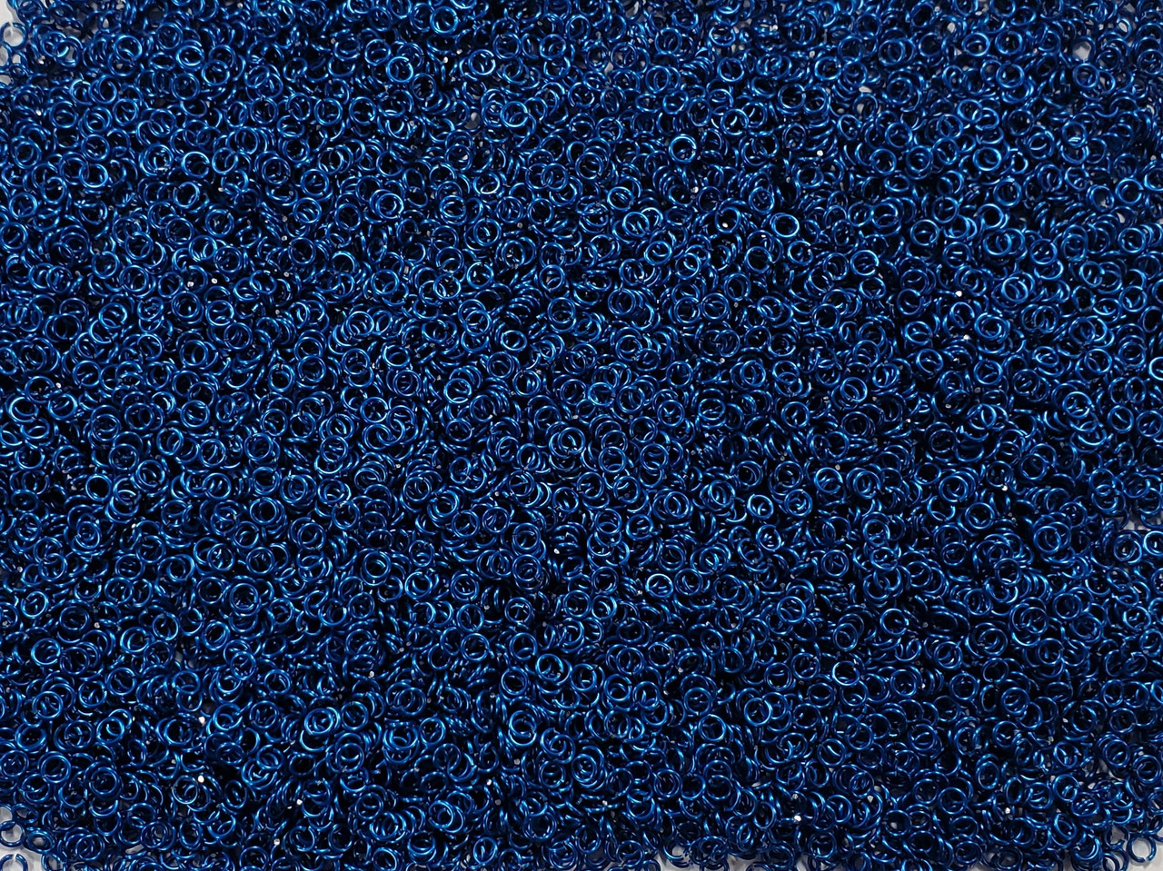 Blue Anodized Aluminum jump rings in 20 SWG, 1/8 inch ID, 1/4 lb (4 oz)