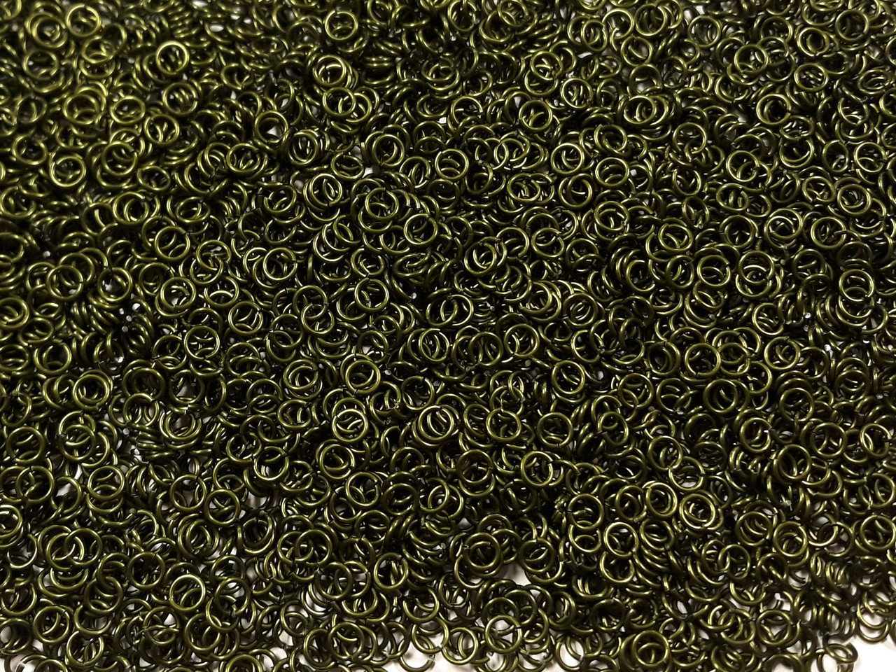 OD Green Anodized Aluminum jump rings in 18 SWG, 3/16 inch ID, 1/2 lb (8 oz)