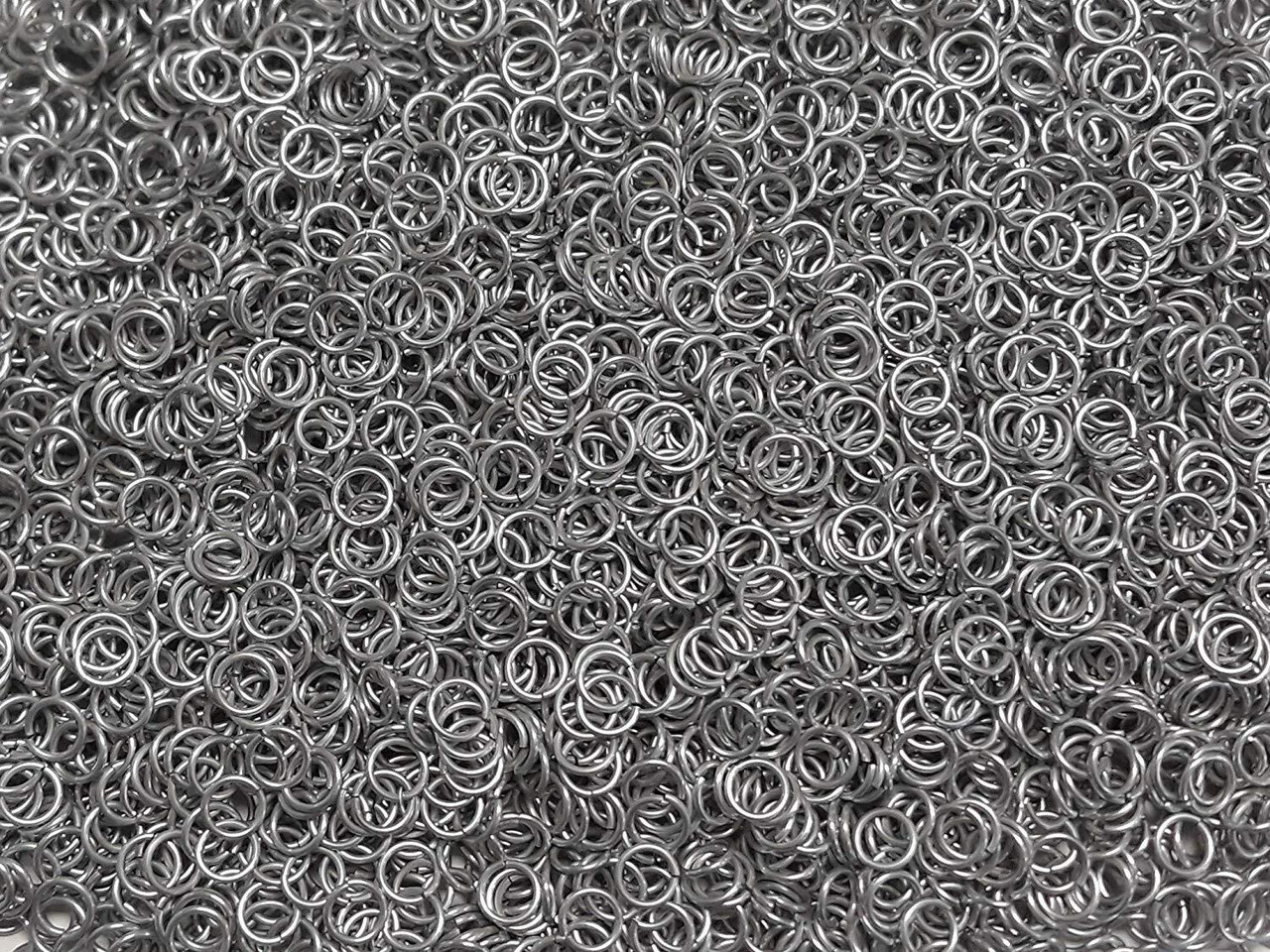 Silver Anodized Aluminum jump rings in 18 SWG, 1/4 inch ID, 1/2 lb (8 oz)