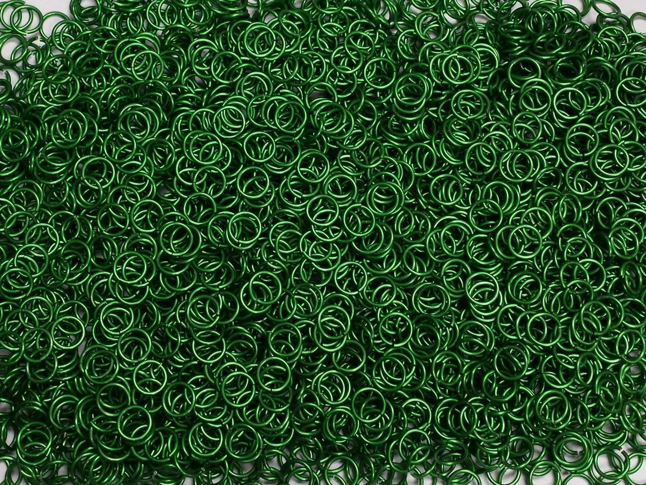 Kelly Green Anodized Aluminum jump rings in 18 SWG, 9/32 inch ID, 1/2 lb (8 oz)