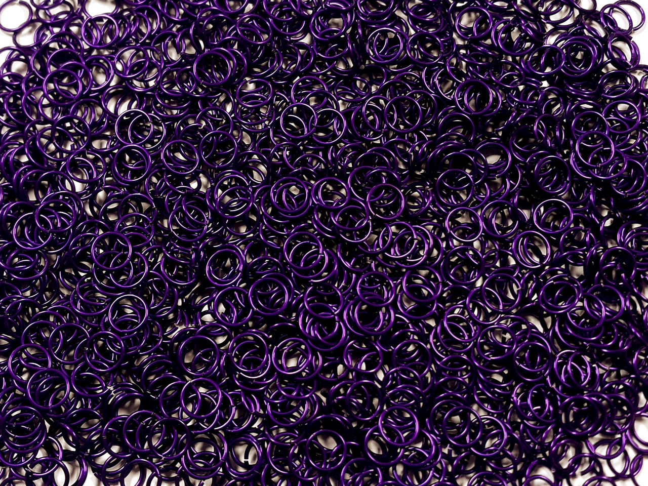 Violet Anodized Aluminum jump rings in 18 SWG, 5/16 inch ID, 1/2 lb (8 oz)