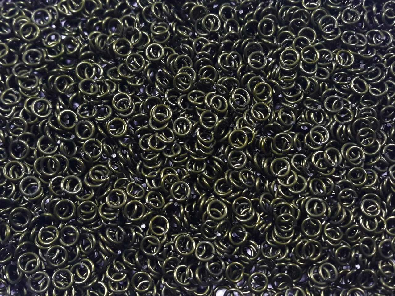 OD Green Anodized Aluminum jump rings in 16 SWG, 3/16 inch ID, 1/2 lb (8 oz)