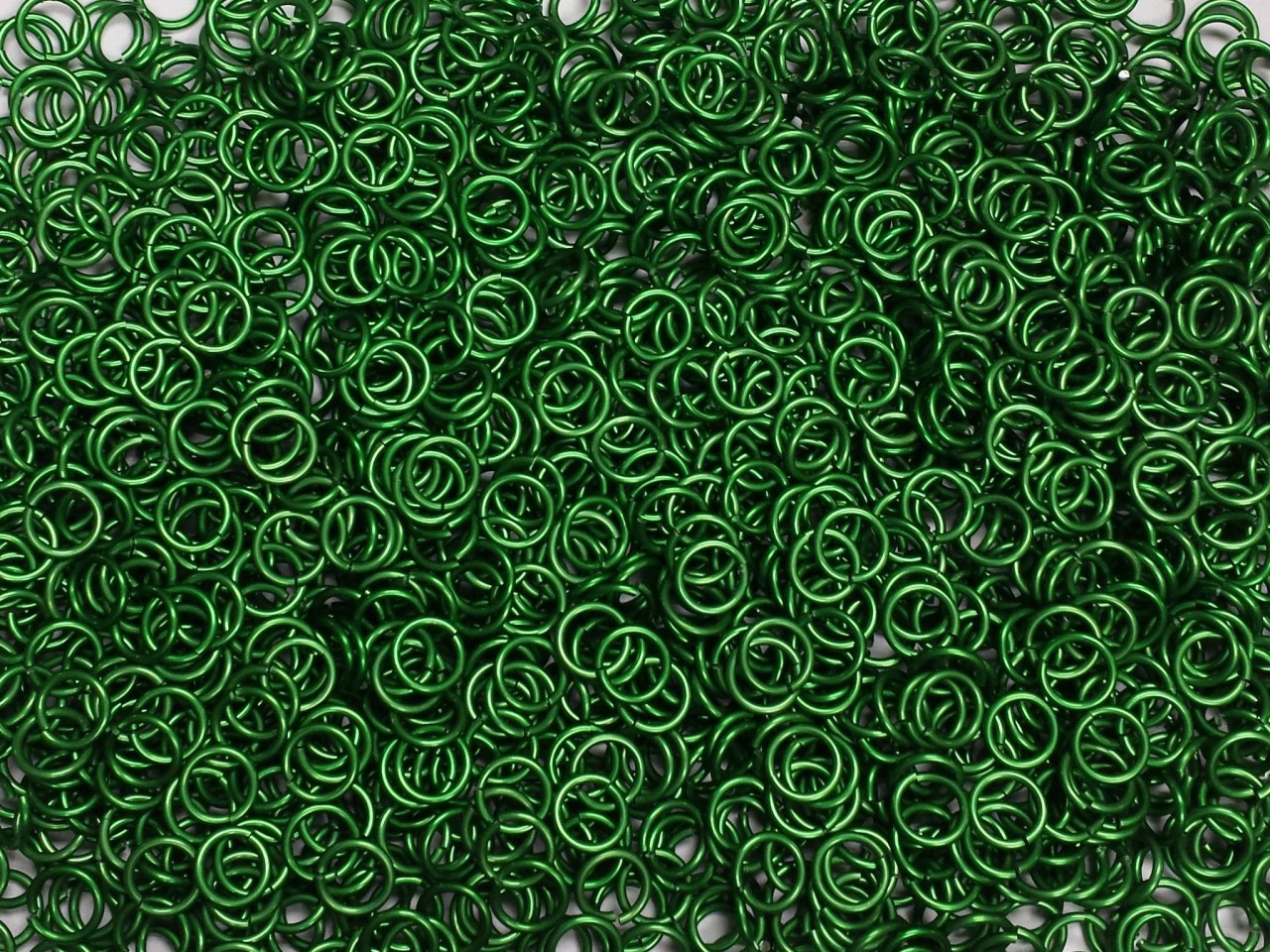 Kelly Green Anodized Aluminum jump rings in 16 SWG, 5/16 inch ID, 1/2 lb (8 oz)