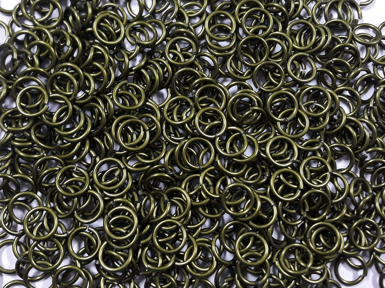 OD Green Anodized Aluminum jump rings in 14 SWG, 3/8 inch ID, 1/2 lb (8 oz)