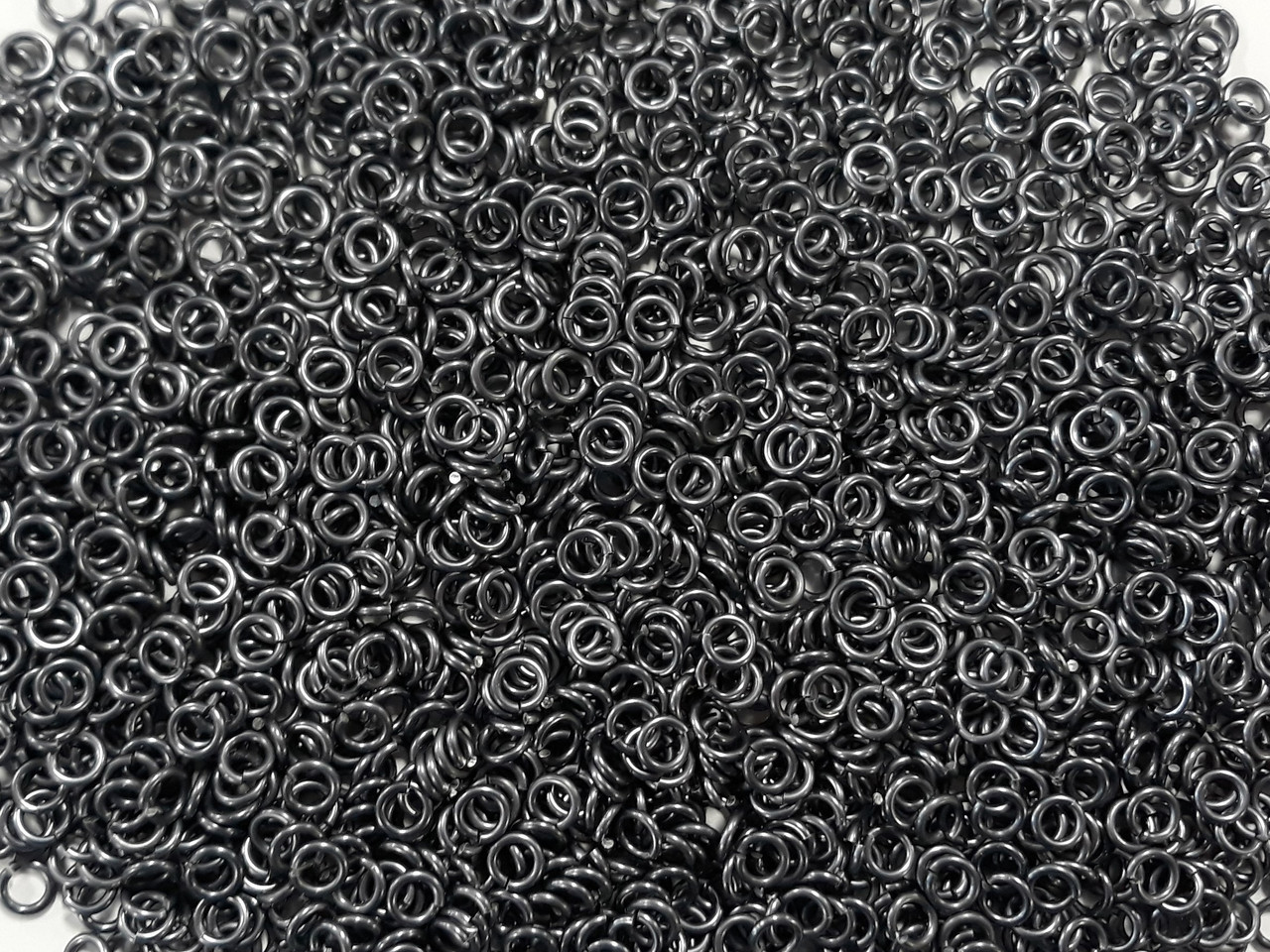 Stormy Gray Anodized Aluminum jump rings in 16 SWG, 3/16 inch ID, 1 oz