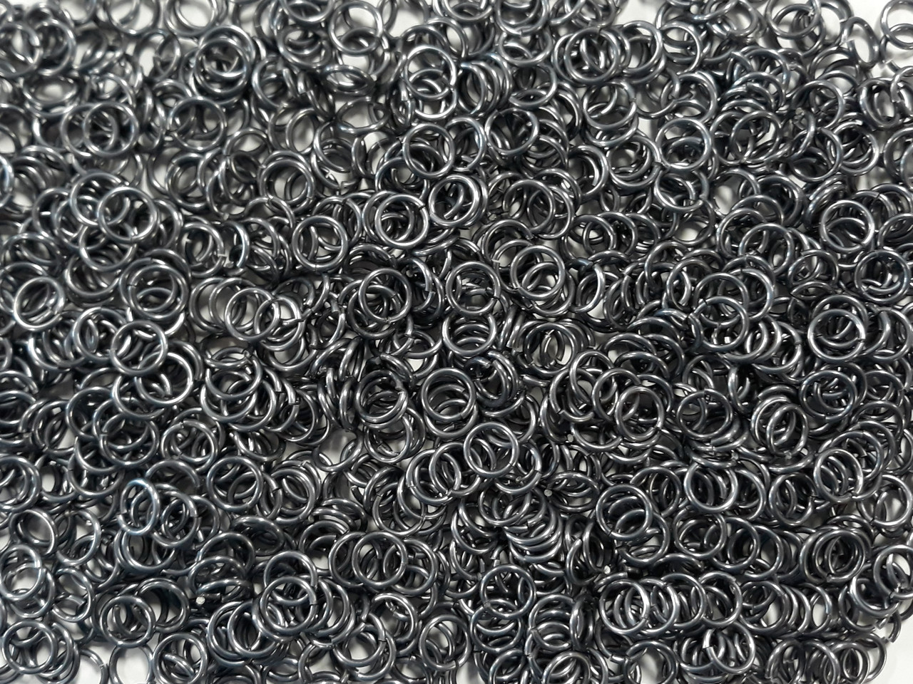 Stormy Gray Anodized Aluminum jump rings in 16 SWG, 5/16 inch ID, 1 oz