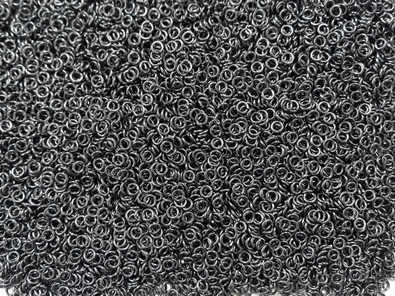 Stormy Gray Anodized Aluminum jump rings in 18 SWG, 9/64 inch ID, 1 oz