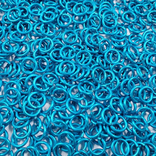 Turquoise Anodized Aluminum jump rings in 14 SWG, 5/16 inch ID, 1 oz