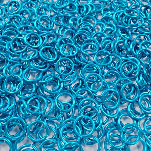 Turquoise Anodized Aluminum jump rings in 16 SWG, 5/16 inch ID, 1 oz