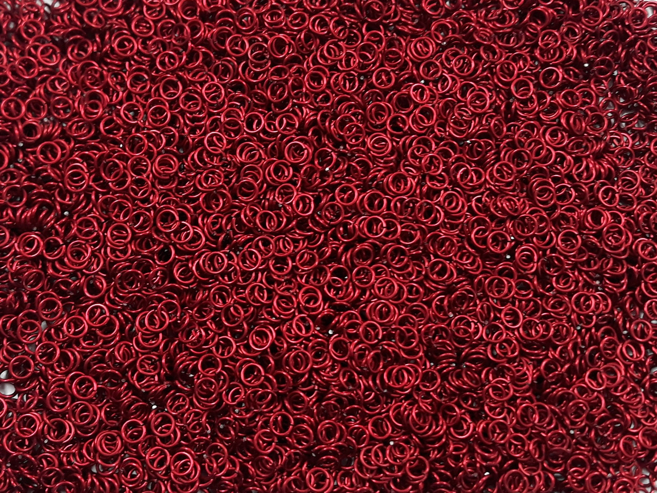 Red Anodized Aluminum jump rings in 20 SWG, 5/32 inch ID, 1 oz
