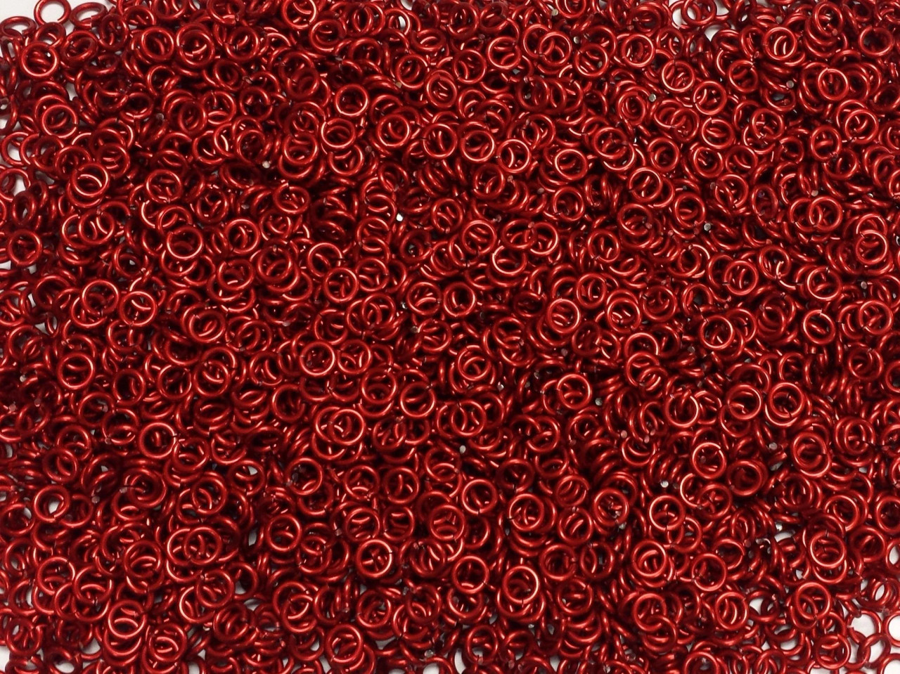 Red Anodized Aluminum jump rings in 16 SWG, 3/16 inch ID, 1 oz