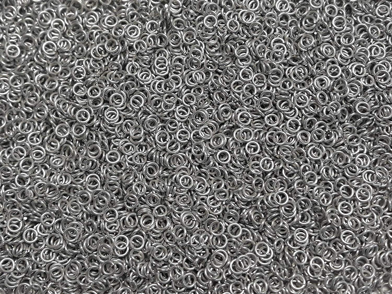 Silver Anodized Aluminum jump rings in 16 SWG, 1/4 inch ID, 1 oz