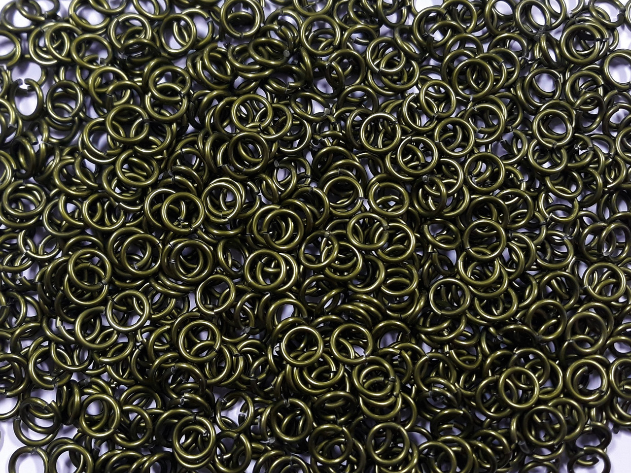 OD Green Anodized Aluminum jump rings in 14 SWG, 5/16 inch ID, 1 oz