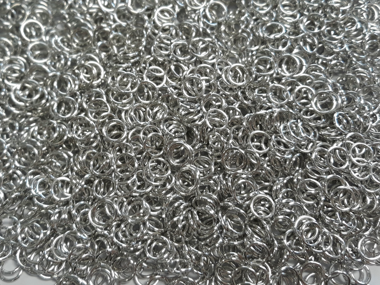 Bright (uncolored) Aluminum jump rings in 18 SWG, 1/4 inch ID, 1 lb