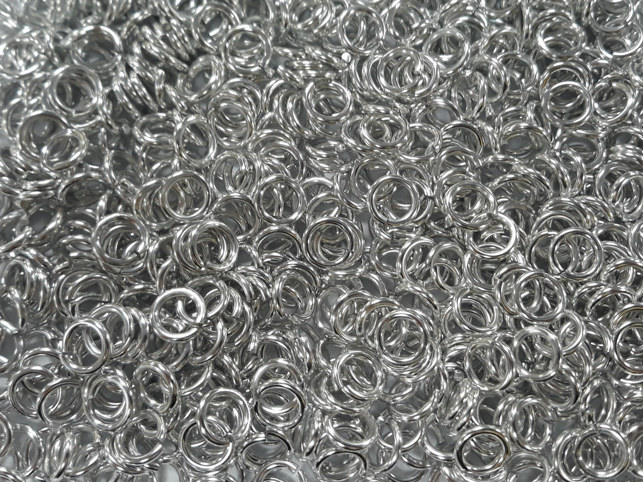 Bright (uncolored) Aluminum jump rings in 16 SWG, 9/32 inch ID, 1 lb