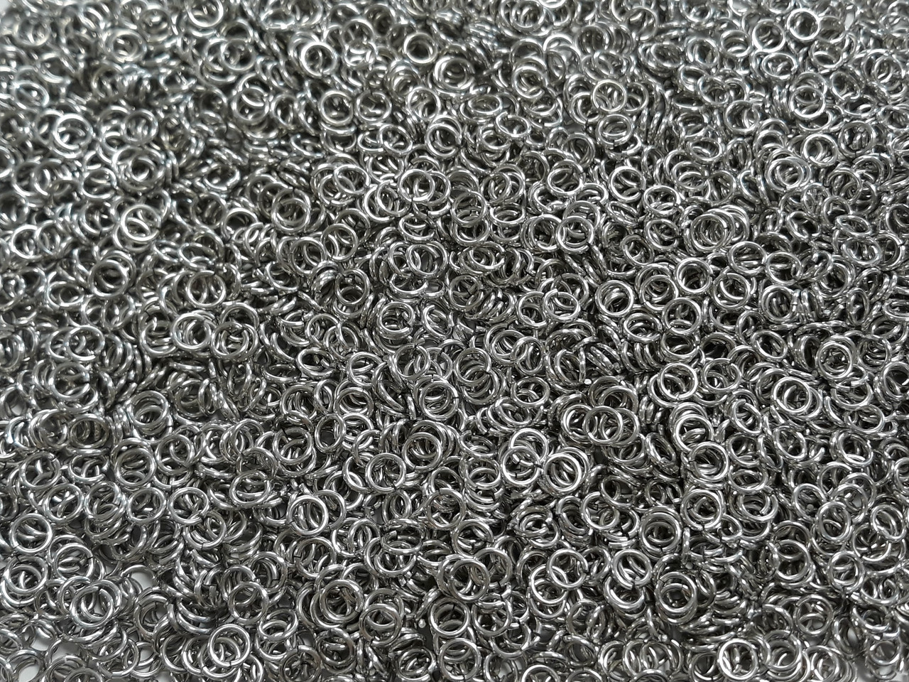 Bright (uncolored) Aluminum jump rings in 18 SWG, 3/16 inch ID, 1/2 lb