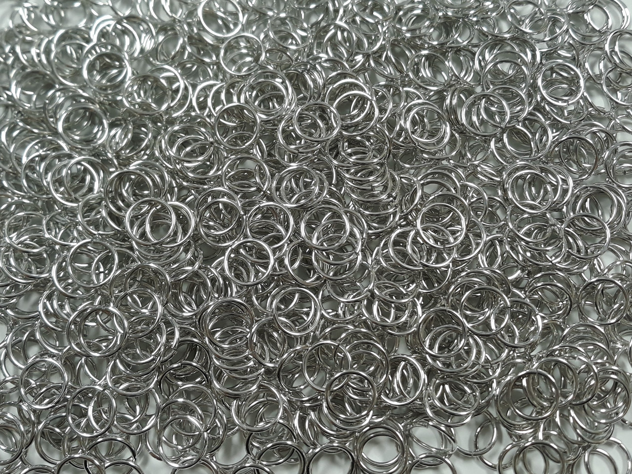 Bright (uncolored) Aluminum jump rings in 16 SWG, 7/16 inch ID, 1 lb