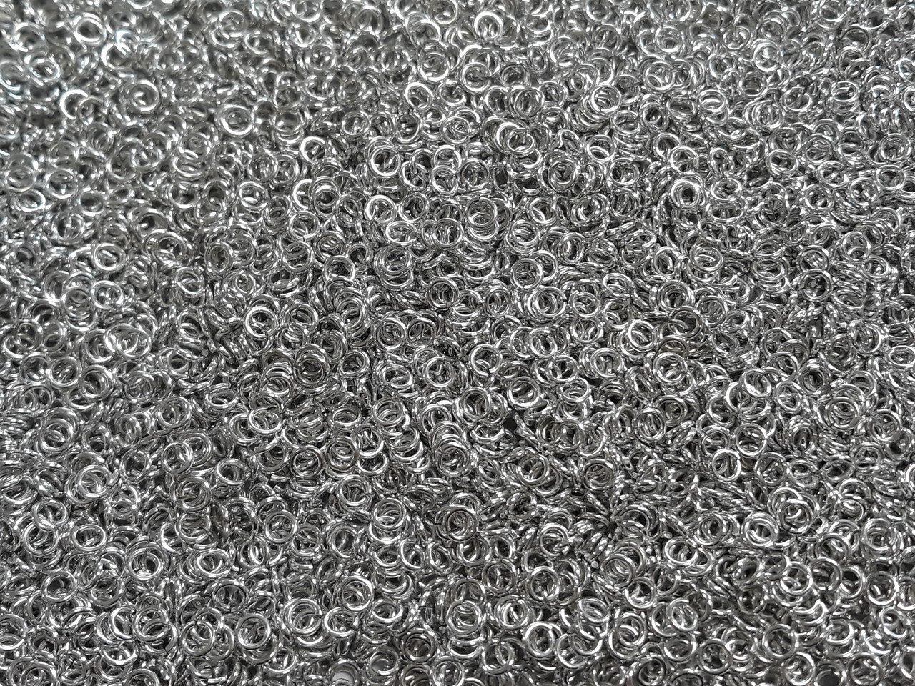 Bright (uncolored) Aluminum jump rings in 18 SWG, 9/64 inch ID, 1/4 lb