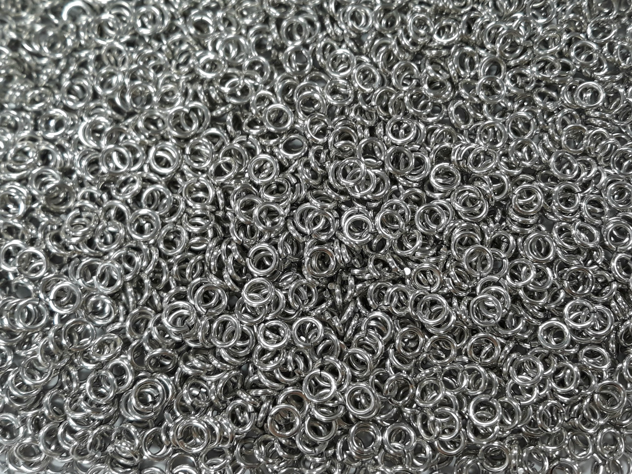 Bright (uncolored) Aluminum jump rings in 16 SWG, 3/16 inch ID, 1 oz