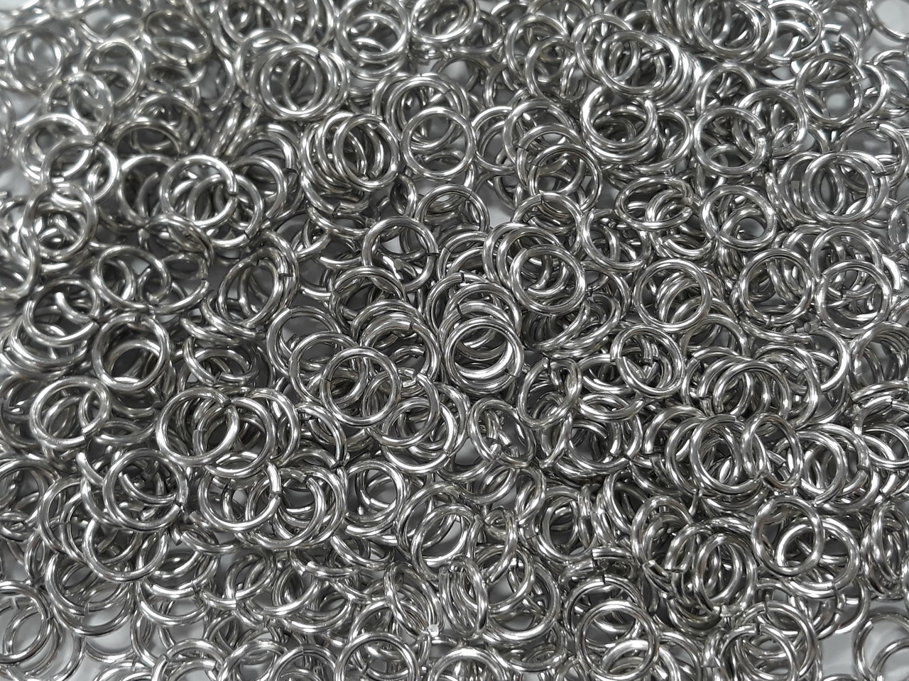 Bright (uncolored) Aluminum jump rings in 14 SWG, 5/16 inch ID, 1 oz
