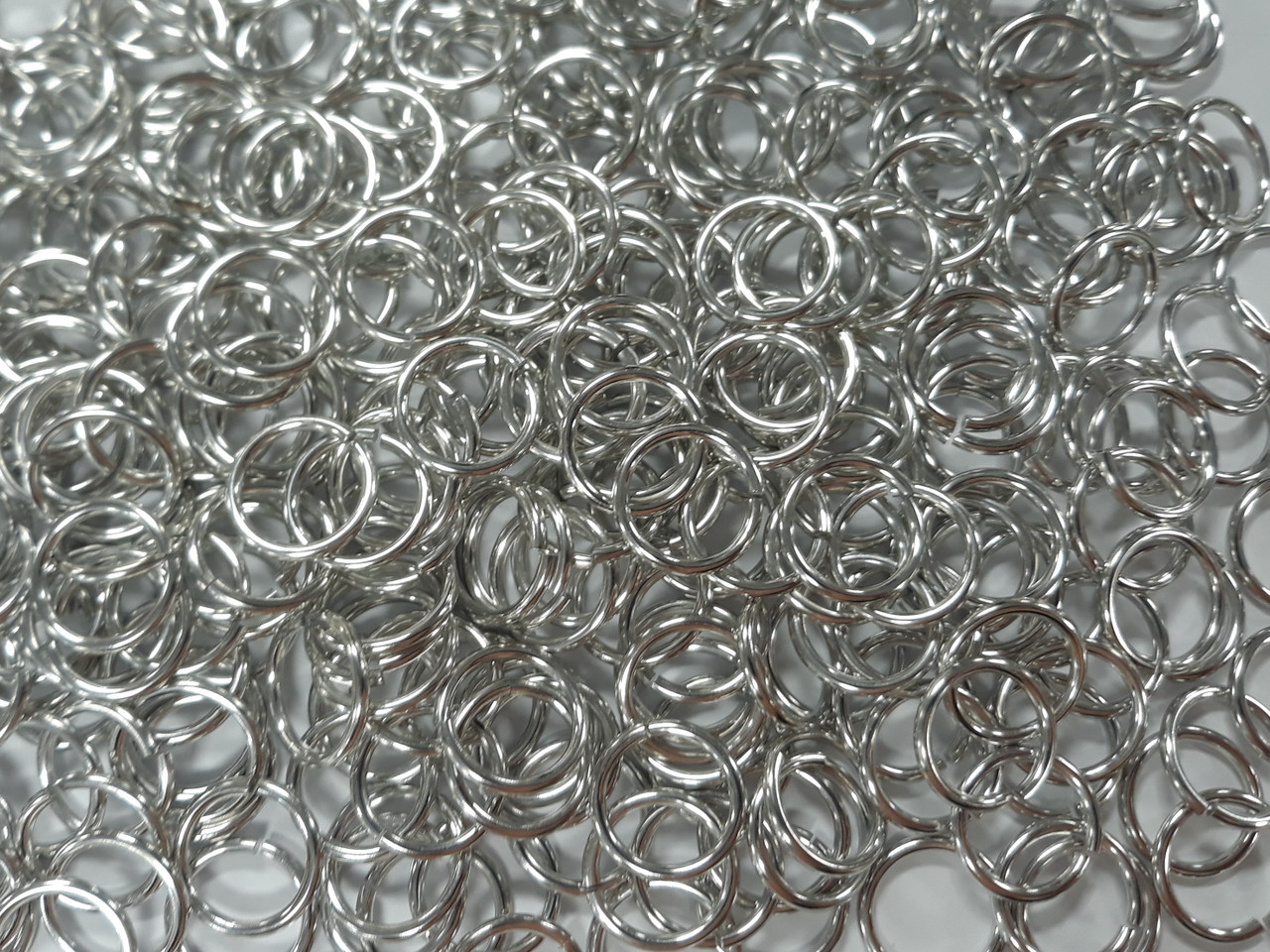 Bright (uncolored) Aluminum jump rings in 14 SWG, 1/2 inch ID, 1 oz