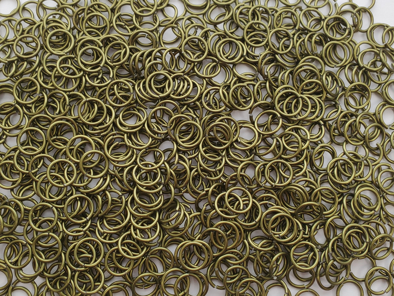 OD Green Anodized Aluminum jump rings in 16 SWG, 3/8 inch ID, 1/2 lb (8 oz)
