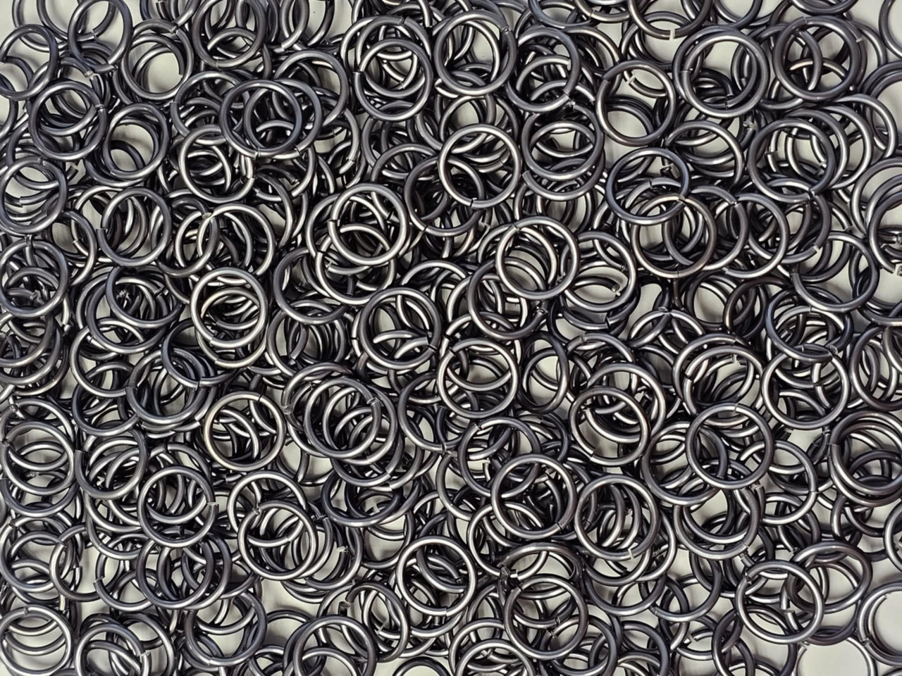 Stormy Gray Anodized Aluminum jump rings in 16 SWG, 3/8 inch ID, 1/2 lb (8 oz)