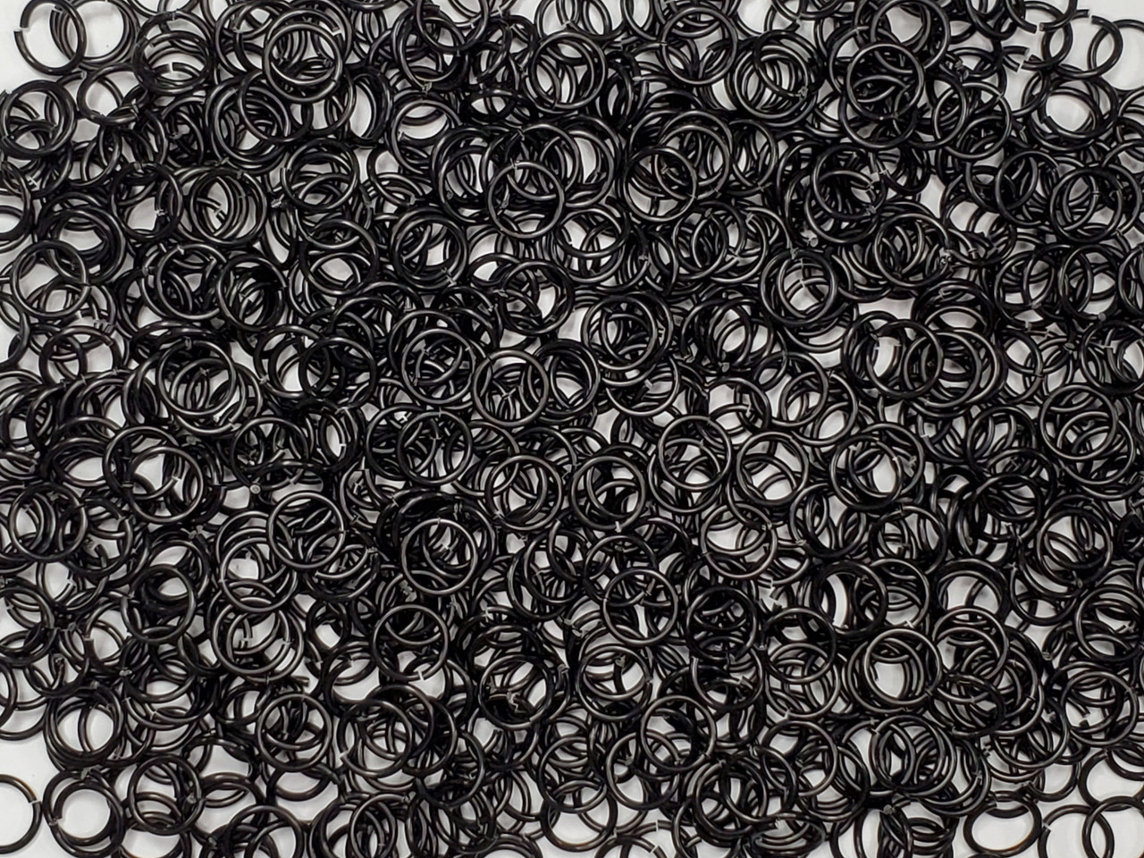Black Anodized Aluminum jump rings in 16 SWG, 3/8 inch ID, 1 oz