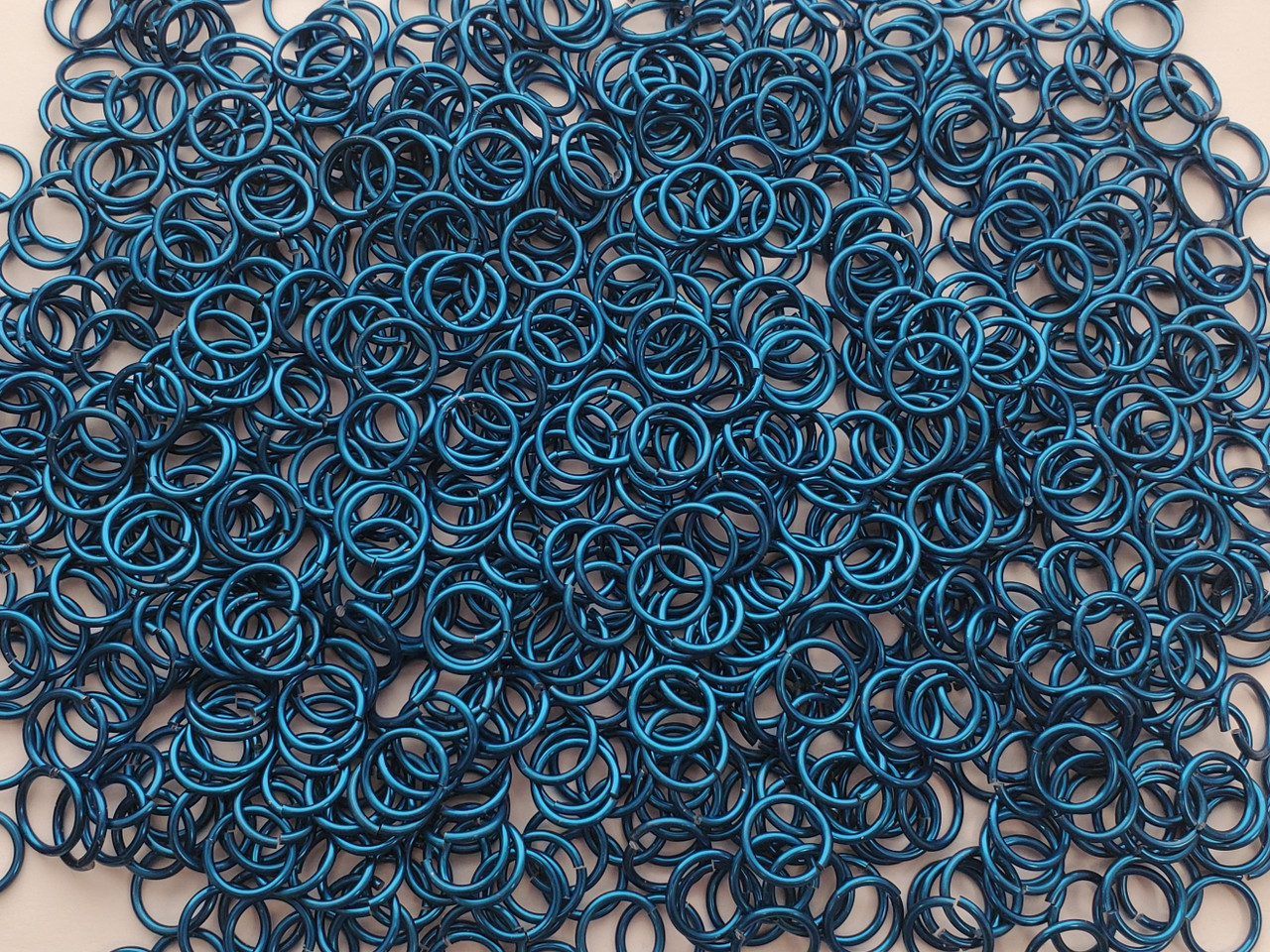 Blue Anodized Aluminum jump rings in 16 SWG, 3/8 inch ID, 1 oz