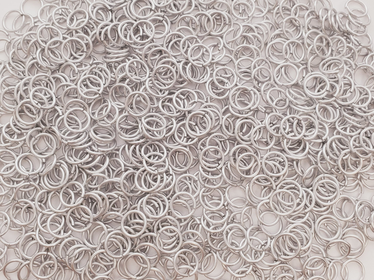Silver Anodized Aluminum jump rings in 16 SWG, 3/8 inch ID, 1 oz